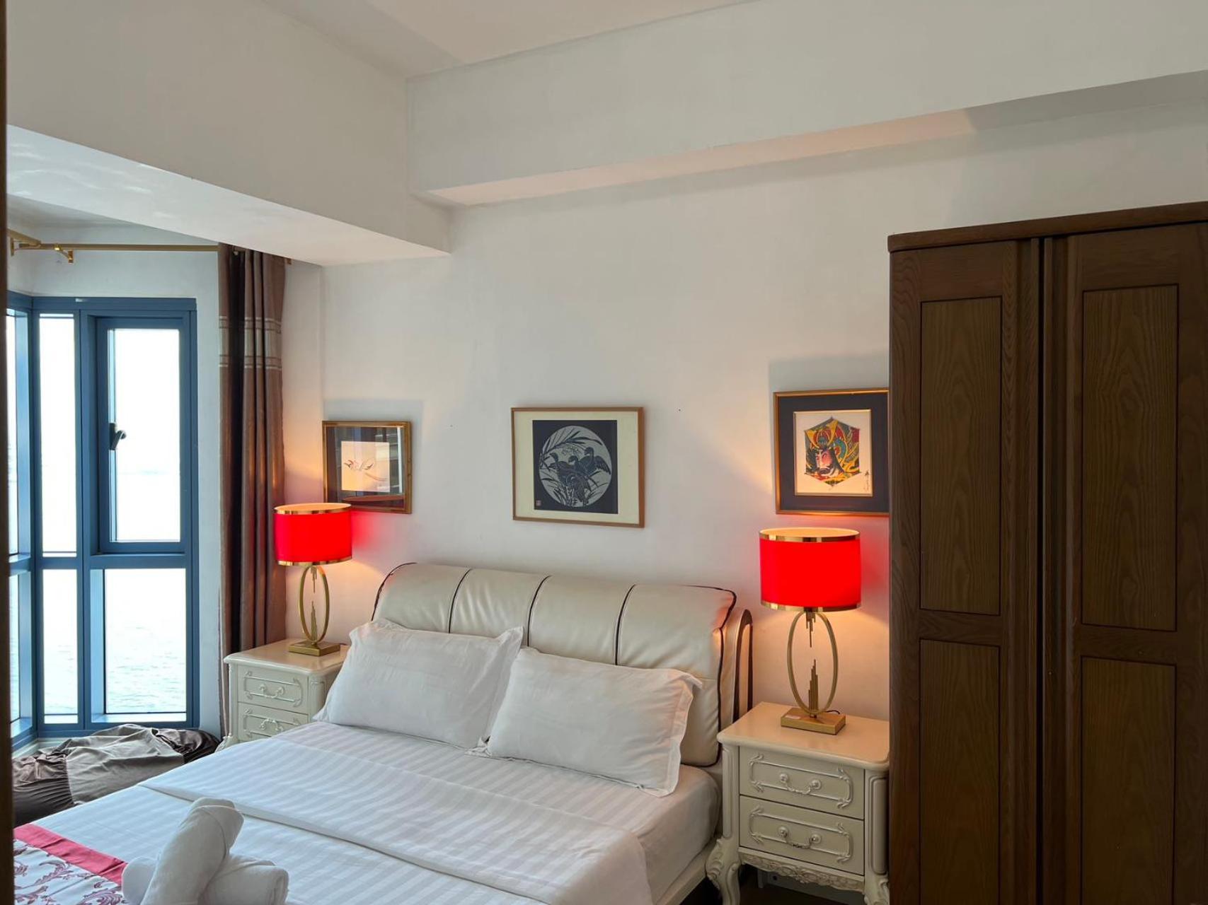 Sunset House Roxas Bay Apartment Manila Bagian luar foto