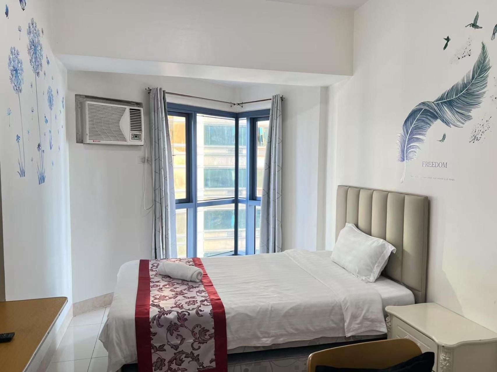Sunset House Roxas Bay Apartment Manila Bagian luar foto