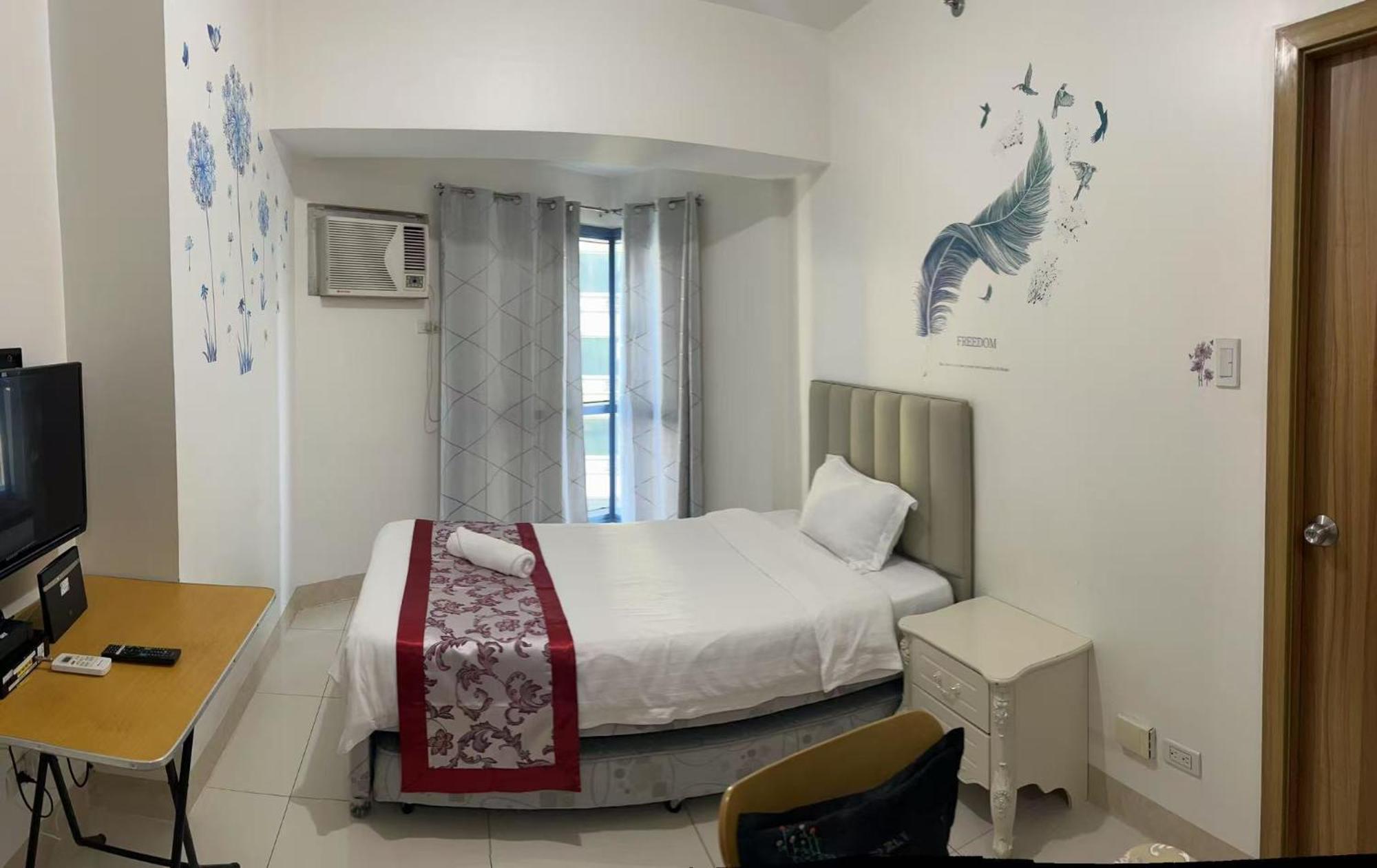 Sunset House Roxas Bay Apartment Manila Bagian luar foto